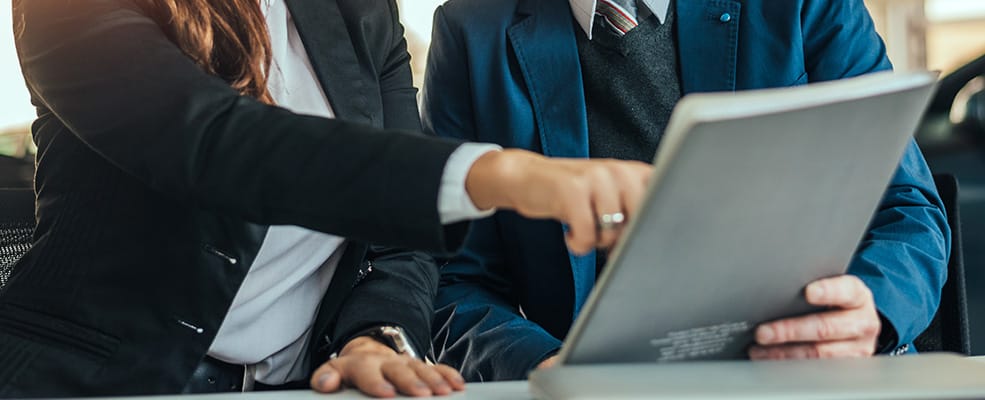 Salesperson And Customer | Orange Energizing Solutions