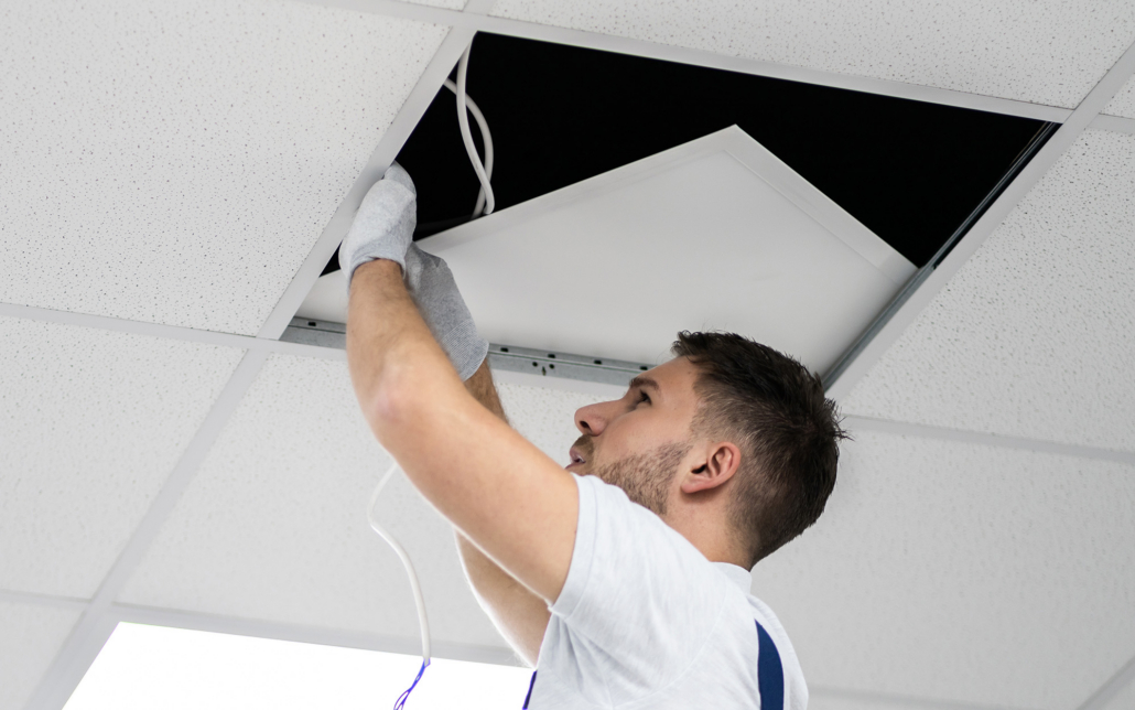 Person Installing Led Roofing Panels